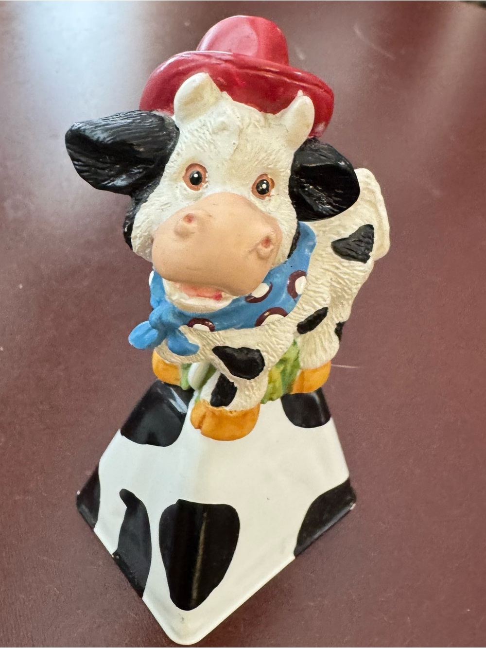 Vintage Cow Figurine with Red Hat and Blue Bandana Bell
